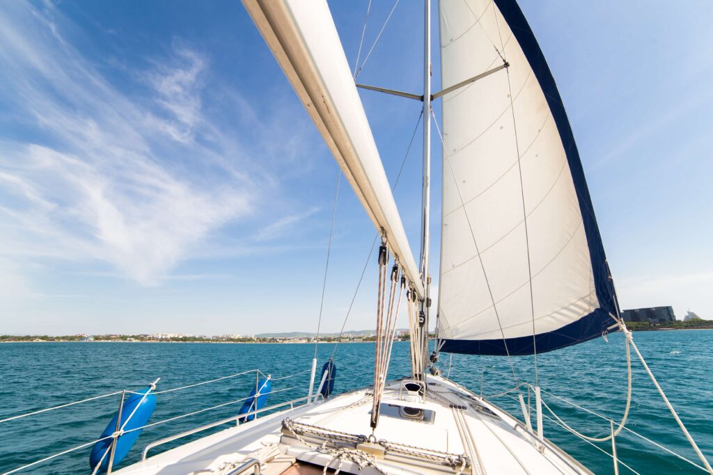 Sails of a yacht using a boat battery charge